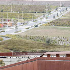 North ramp off-road bridge directing down to the wetlands with wetland bridge in the background_