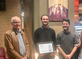 William Chrisp (middle) was awarded the scholarship at an NZILA event in Wellington. Bill Vincent (left) from Megabits made the presentation. NZILA Wellington Branch Chair Brennan Baxley is on the right.