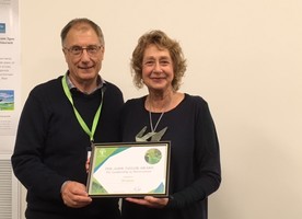 Di Lucas being presented the John Taylor Award by Allan Jolliffe