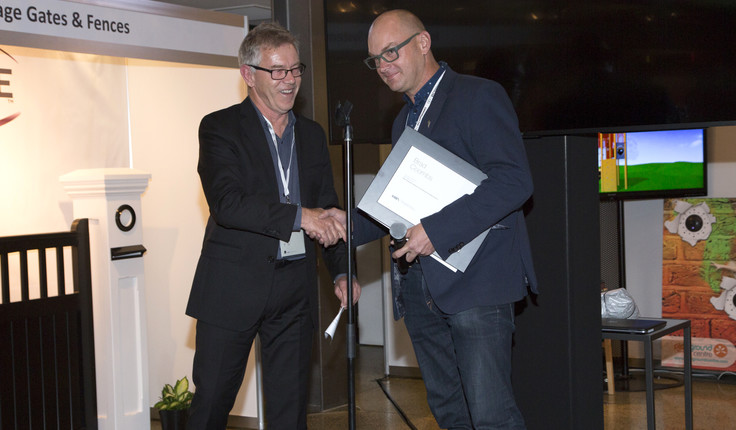 Brad Coombs (on right) after being announced as an NZILA Fellow at the 2018 NZILA Firth conference in Auckland.