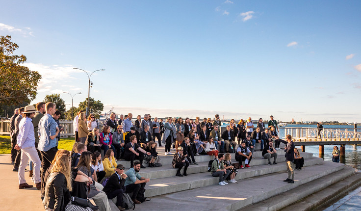 Scott Greenhalgh from LandLAB speaks to delegates on the City Centre Projects Walking Tour.