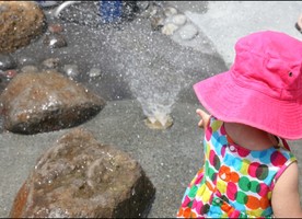 Young children enjoy the opportunity to interact with the water at their own pace.