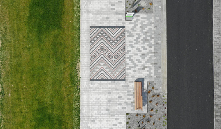 Avon River Promenade - 3km of shared zone combining landscape and integrated artworks - including this example of Ngā Whāriki Manaaki - Woven Mats of Welcome within promenade paving.