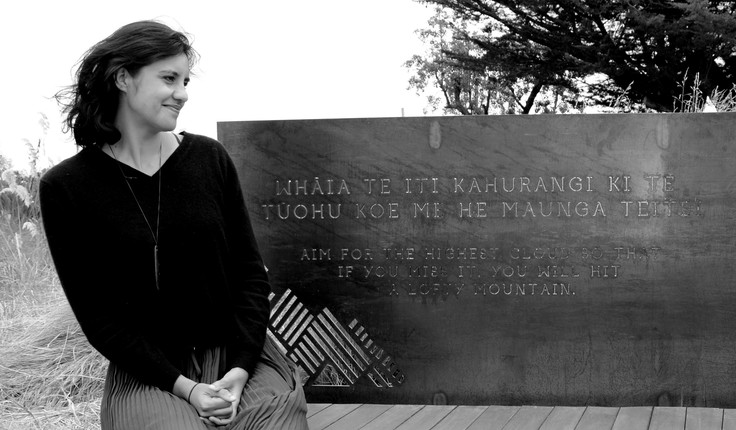 Daughter Ana Heremaia on the memorial seat.