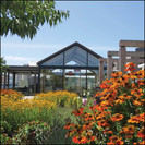 A Petanque court, loop walk, butterfly walk, cut flower gardens and a food production garden all centre around a central communal pavilion building.