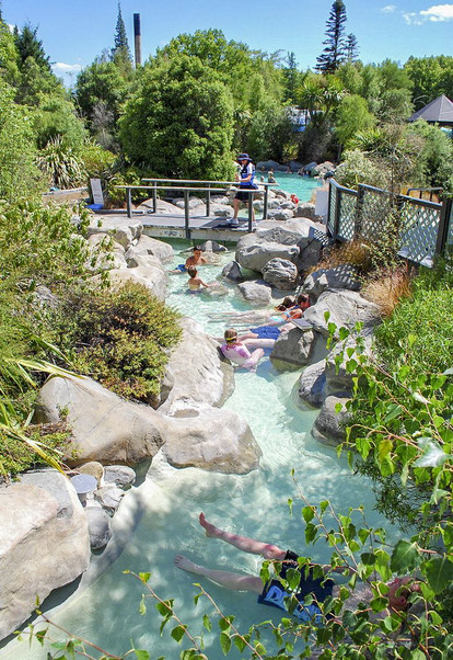 Visitors enjoying pools