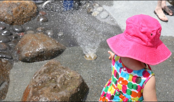 Young children enjoy the opportunity to interact with the water at their own pace.