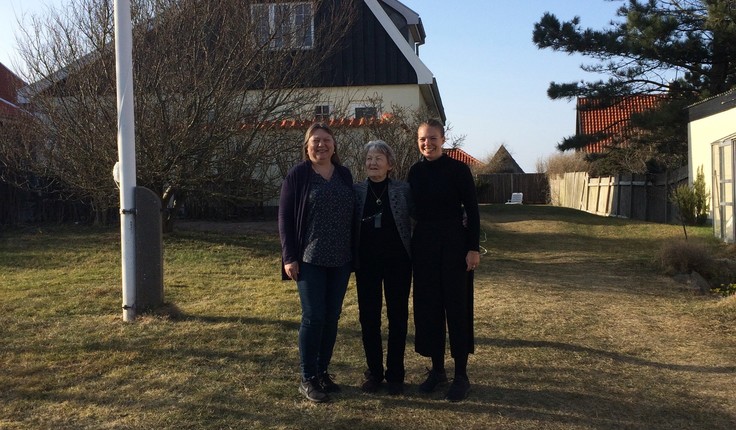 Linnea with her mother, and maternal grandmother in front of the family home in Liseleje, Denmark