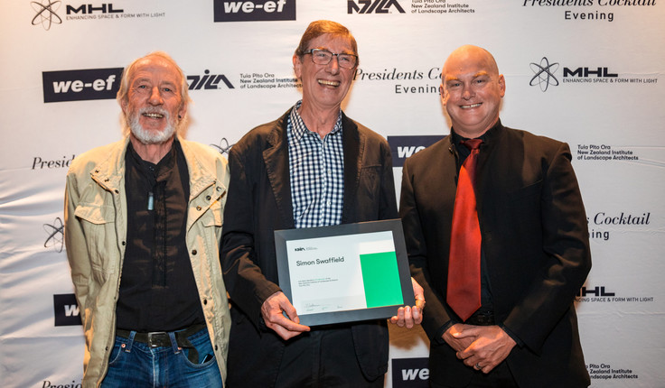 Dr Simon Swaffield (centre) after receiving his NZILA Life Member Award last night in Tauranga.