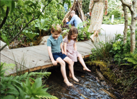 Prince George and Princess Charlotte take in their mother’s garden design. Photo credit: Matt Porteous/Kensington Palace