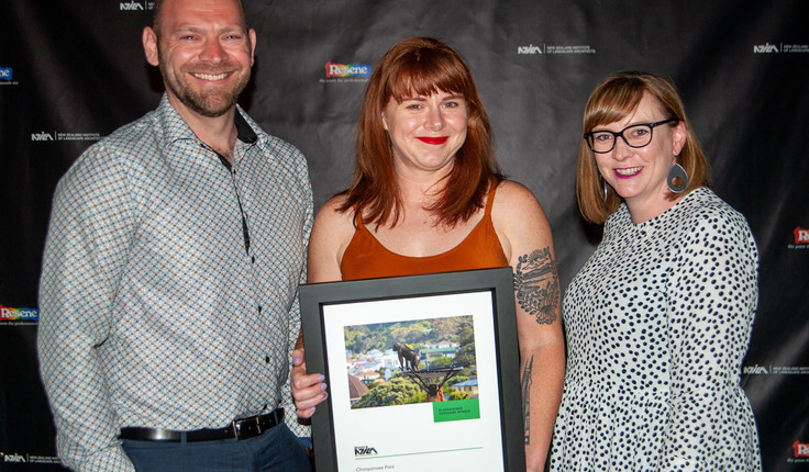 Chris Jerram (left) and Sophie Jacques (middle) join Amy Hughes from Wellington Zoo with their award.