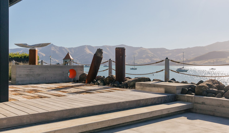 Xteriorscapes took special trips to Lyttelton Port to hand-pick recycled timber features with the clients, and chose local boulders from a nearby farm.