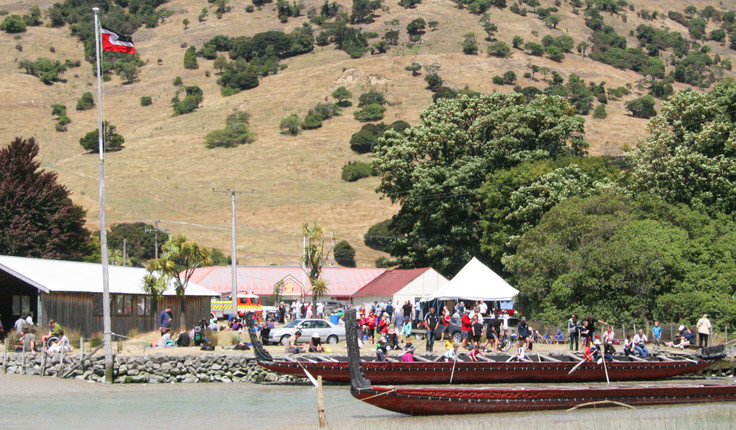 Waka taua tied up at the marae, Okain’s Bay Waitangi Celebrations 2014 (na Neil Challenger)